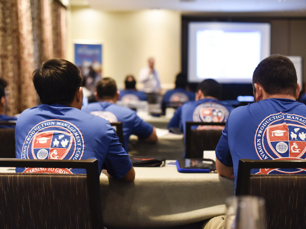 Students at an APMS school presentation